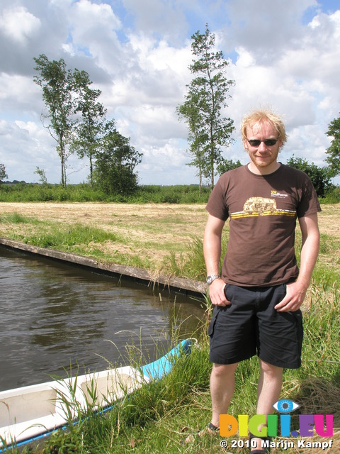 JT00991 Marijn and canoe at little island in lake 'De Fluezen', The Netherlands